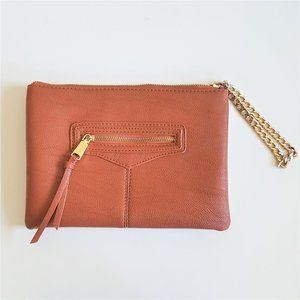 Co-lab vegan leather clutch with gold chain.